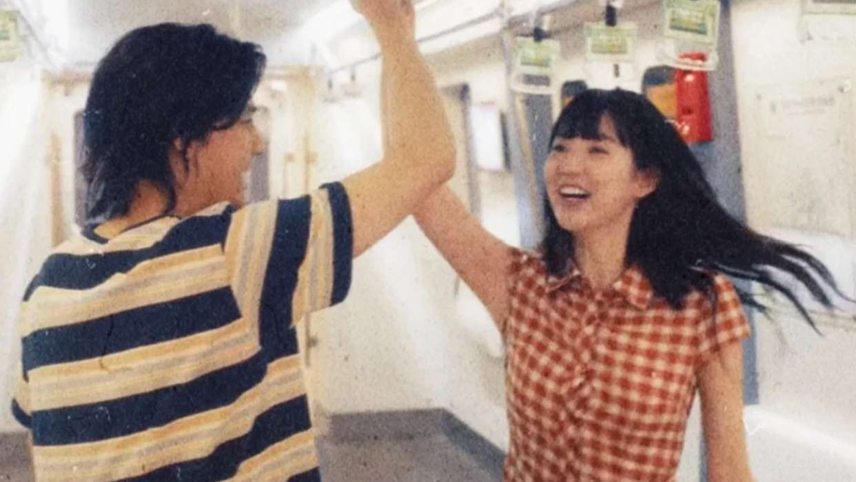 Spinning, laughing, off the stairwell